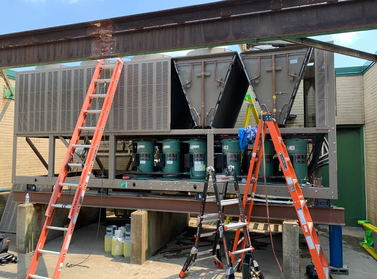 Commercial air-cooled chiller opened for service at a ZMS work site